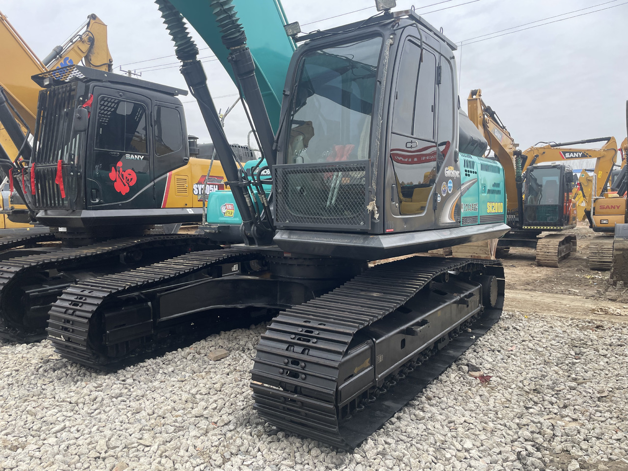 KOBELCO SK200-8 - Telakaivukone: kuva KOBELCO SK200-8 - Telakaivukone KOBELCO SK200-8 - Telakaivukone: kuva KOBELCO SK200-8 - Telakaivukone