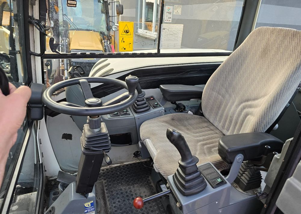 Terex - Pyöräalustainen kaivinkone: kuva Terex - Pyöräalustainen kaivinkone Terex - Pyöräalustainen kaivinkone: kuva Terex - Pyöräalustainen kaivinkone