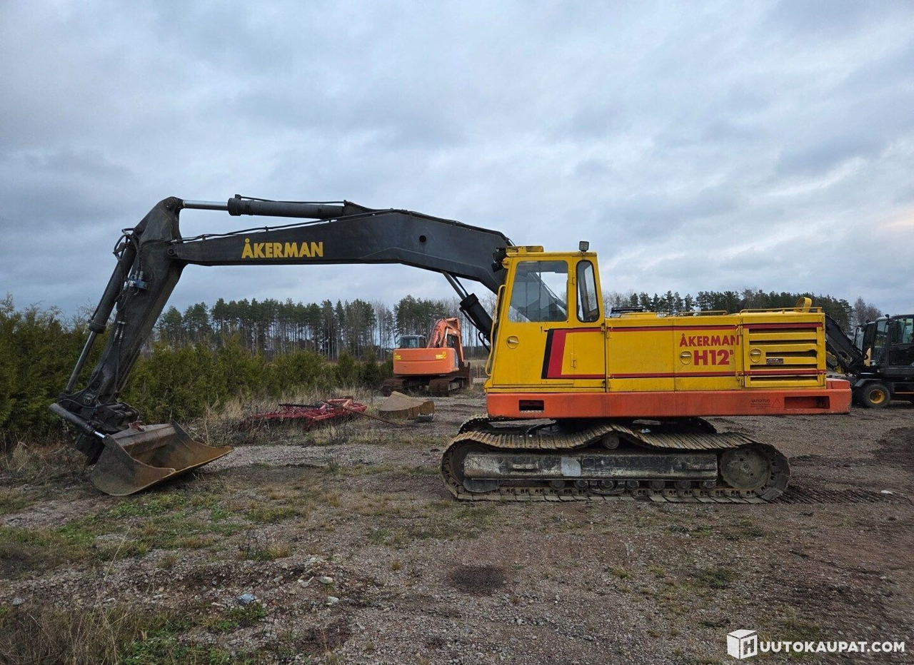 Åkerman H12B, 1983, Diesel Excavator, Honkajoki - Telakaivukone: kuva Åkerman H12B, 1983, Diesel Excavator, Honkajoki - Telakaivukone Åkerman H12B, 1983, Diesel Excavator, Honkajoki - Telakaivukone: kuva Åkerman H12B, 1983, Diesel Excavator, Honkajoki - Telakaivukone