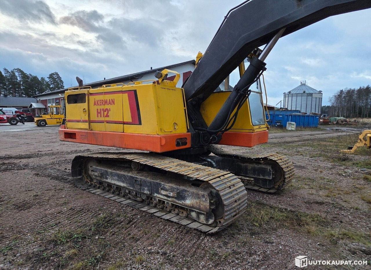 Åkerman H12B, 1983, Diesel Excavator, Honkajoki - Telakaivukone: kuva Åkerman H12B, 1983, Diesel Excavator, Honkajoki - Telakaivukone Åkerman H12B, 1983, Diesel Excavator, Honkajoki - Telakaivukone: kuva Åkerman H12B, 1983, Diesel Excavator, Honkajoki - Telakaivukone