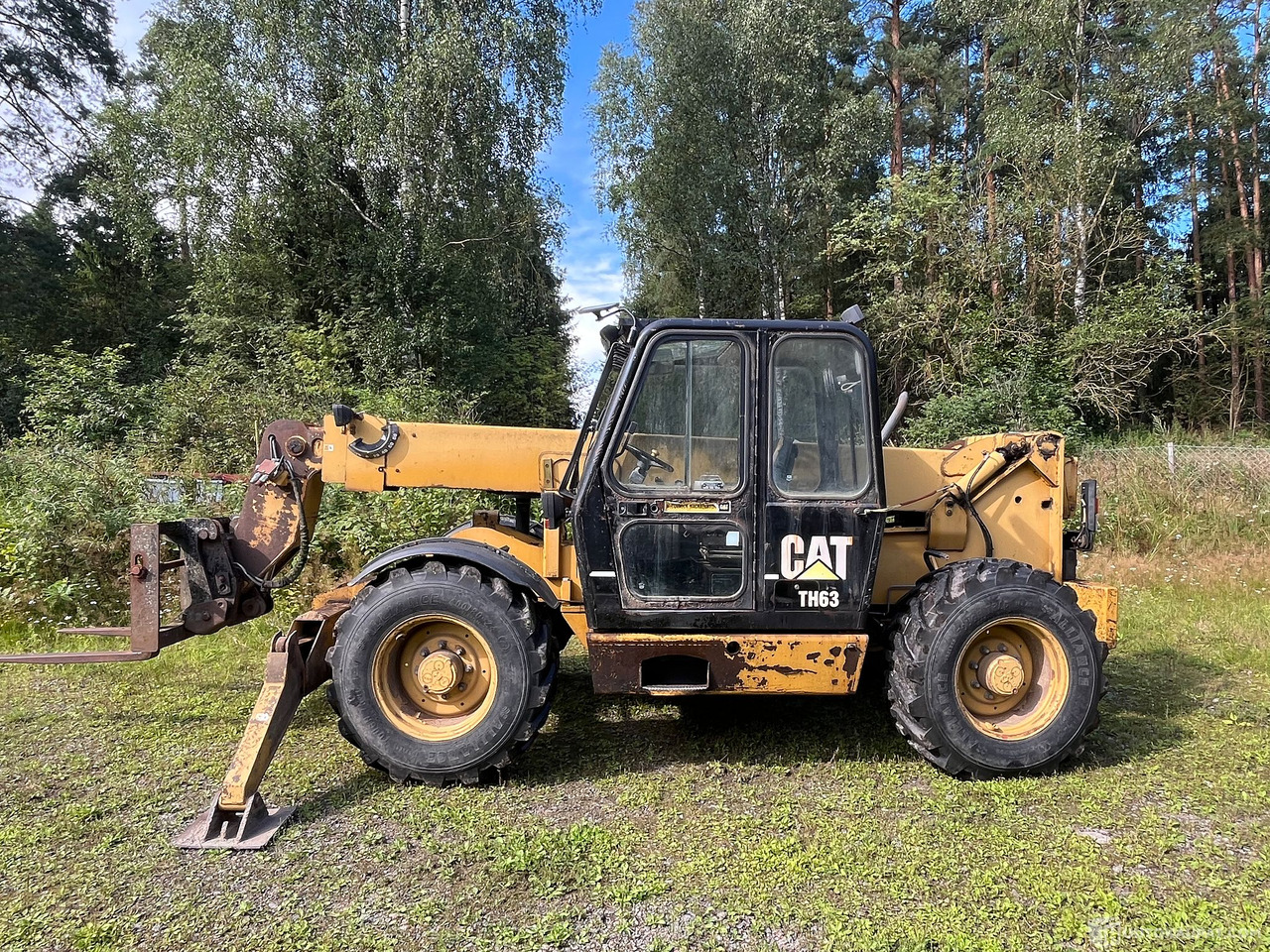 Caterpillar TH63, kurottaja piikeillä ja kauhalla, 2002, Loppi - Maatalouskoneet: kuva Caterpillar TH63, kurottaja piikeillä ja kauhalla, 2002, Loppi - Maatalouskoneet Caterpillar TH63, kurottaja piikeillä ja kauhalla, 2002, Loppi - Maatalouskoneet: kuva Caterpillar TH63, kurottaja piikeillä ja kauhalla, 2002, Loppi - Maatalouskoneet