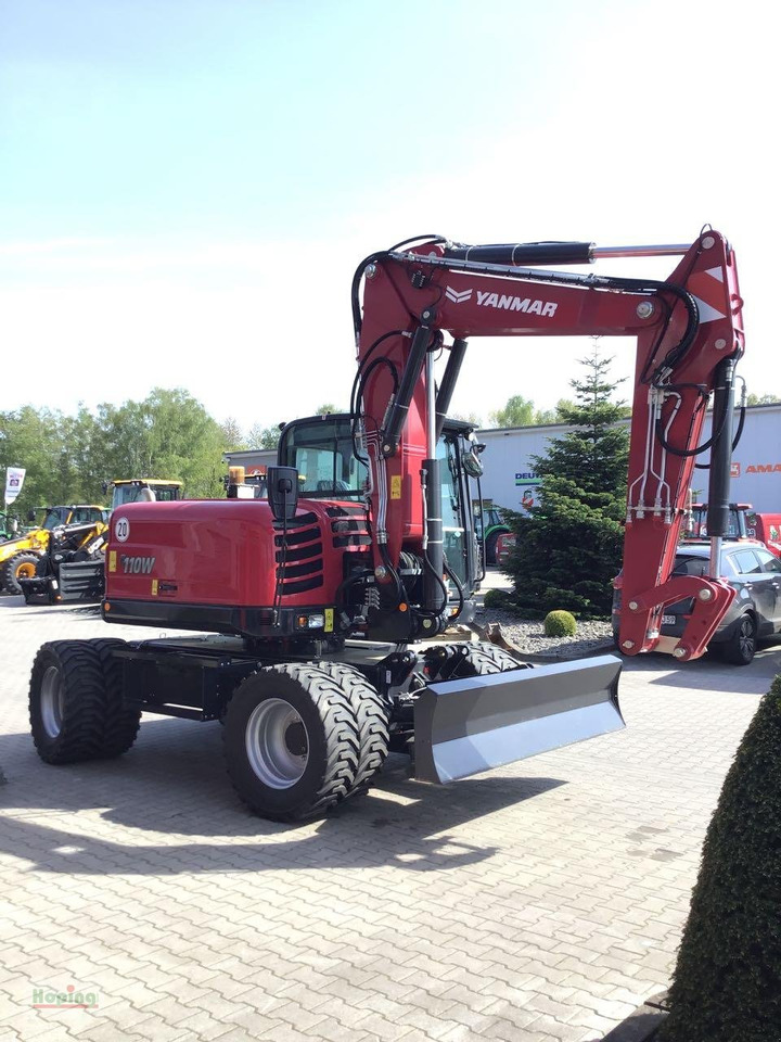 Yanmar B110W - Pyöräalustainen kaivinkone: kuva Yanmar B110W - Pyöräalustainen kaivinkone Yanmar B110W - Pyöräalustainen kaivinkone: kuva Yanmar B110W - Pyöräalustainen kaivinkone