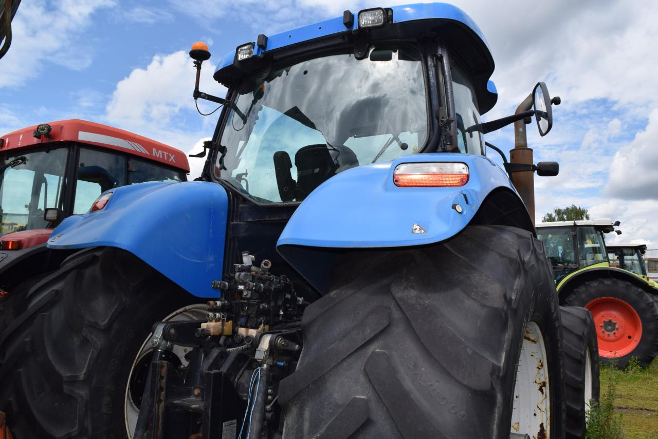 New Holland T 7040 - Traktori: kuva New Holland T 7040 - Traktori New Holland T 7040 - Traktori: kuva New Holland T 7040 - Traktori