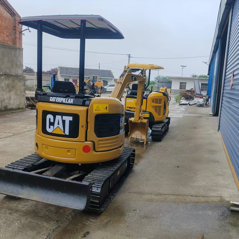 CATERPILLAR 303E CR - Minikuormaaja: kuva CATERPILLAR 303E CR - Minikuormaaja CATERPILLAR 303E CR - Minikuormaaja: kuva CATERPILLAR 303E CR - Minikuormaaja