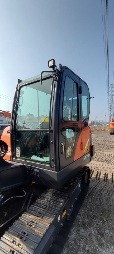 DOOSAN DX60E - Minikuormaaja: kuva DOOSAN DX60E - Minikuormaaja DOOSAN DX60E - Minikuormaaja: kuva DOOSAN DX60E - Minikuormaaja