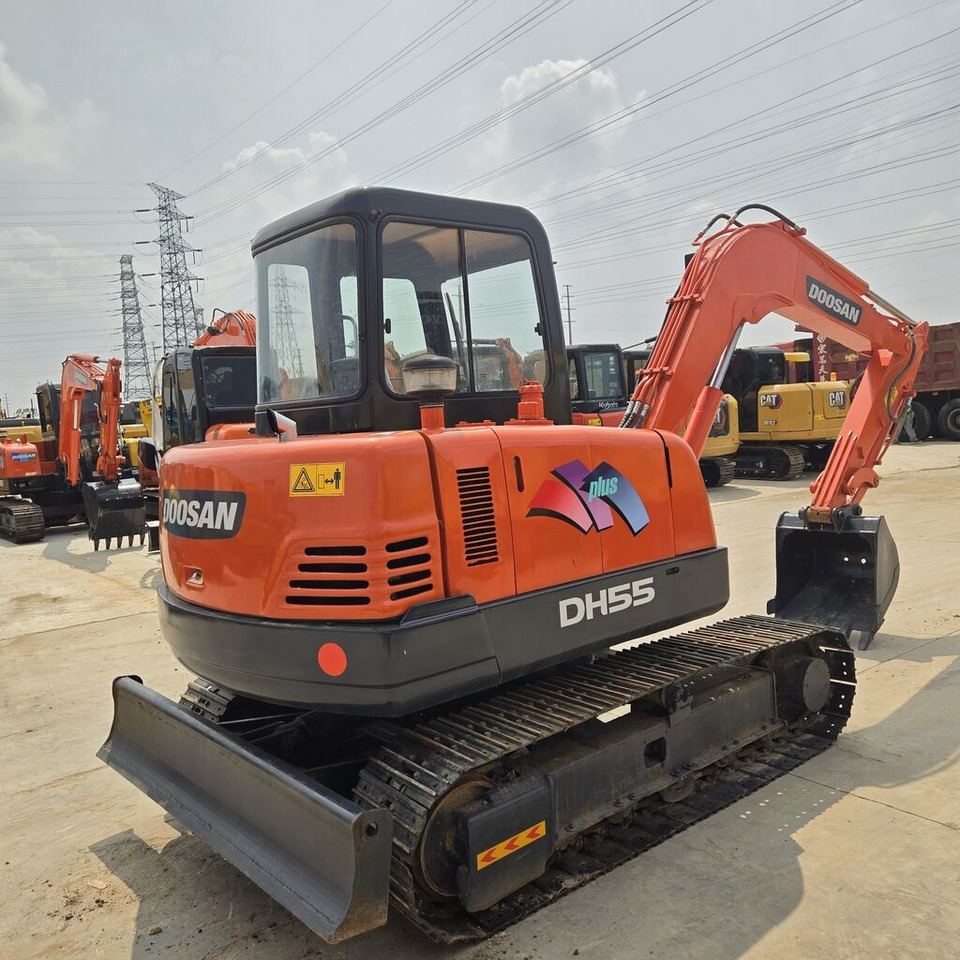 Doosan DH55 - Minikuormaaja: kuva Doosan DH55 - Minikuormaaja Doosan DH55 - Minikuormaaja: kuva Doosan DH55 - Minikuormaaja