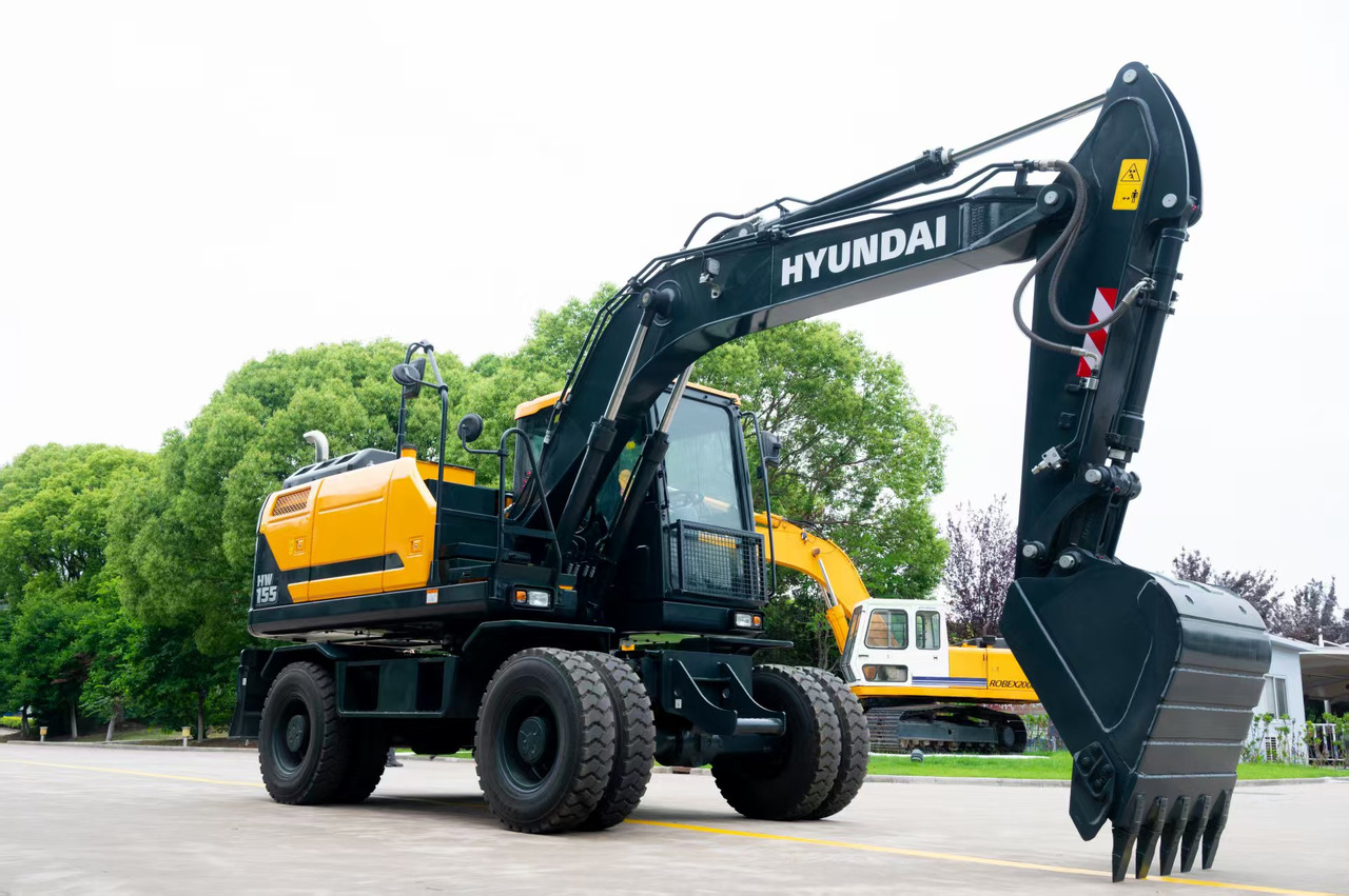 HYUNDAI HW155 - Pyöräalustainen kaivinkone: kuva HYUNDAI HW155 - Pyöräalustainen kaivinkone HYUNDAI HW155 - Pyöräalustainen kaivinkone: kuva HYUNDAI HW155 - Pyöräalustainen kaivinkone