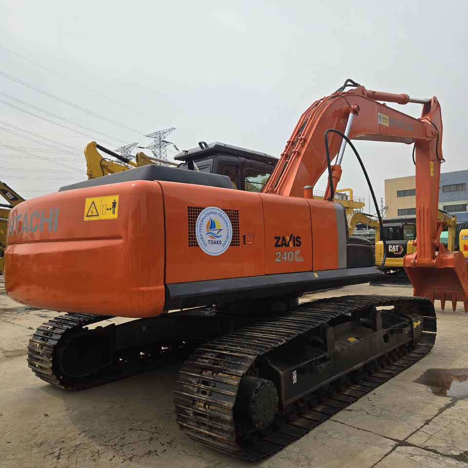 Hitachi ZX240 - Telakaivukone: kuva Hitachi ZX240 - Telakaivukone Hitachi ZX240 - Telakaivukone: kuva Hitachi ZX240 - Telakaivukone