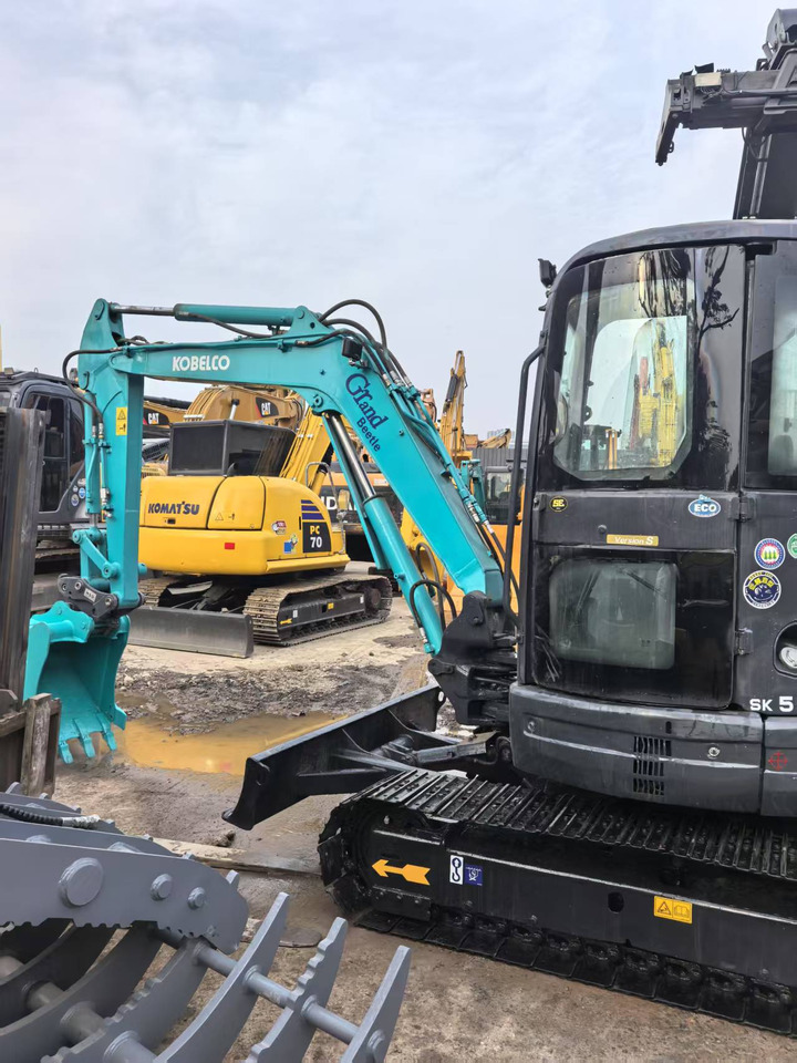 KOBELCO SK55SR - Minikuormaaja: kuva KOBELCO SK55SR - Minikuormaaja KOBELCO SK55SR - Minikuormaaja: kuva KOBELCO SK55SR - Minikuormaaja