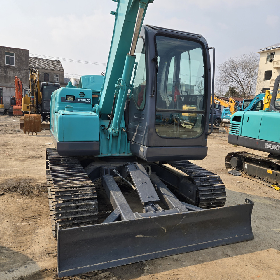 Kobelco SK75-8 - Minikuormaaja: kuva Kobelco SK75-8 - Minikuormaaja Kobelco SK75-8 - Minikuormaaja: kuva Kobelco SK75-8 - Minikuormaaja