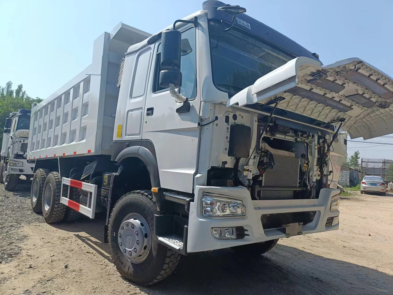 SINOTRUK HOWO - Kippiauto kuorma-auto: kuva SINOTRUK HOWO - Kippiauto kuorma-auto SINOTRUK HOWO - Kippiauto kuorma-auto: kuva SINOTRUK HOWO - Kippiauto kuorma-auto