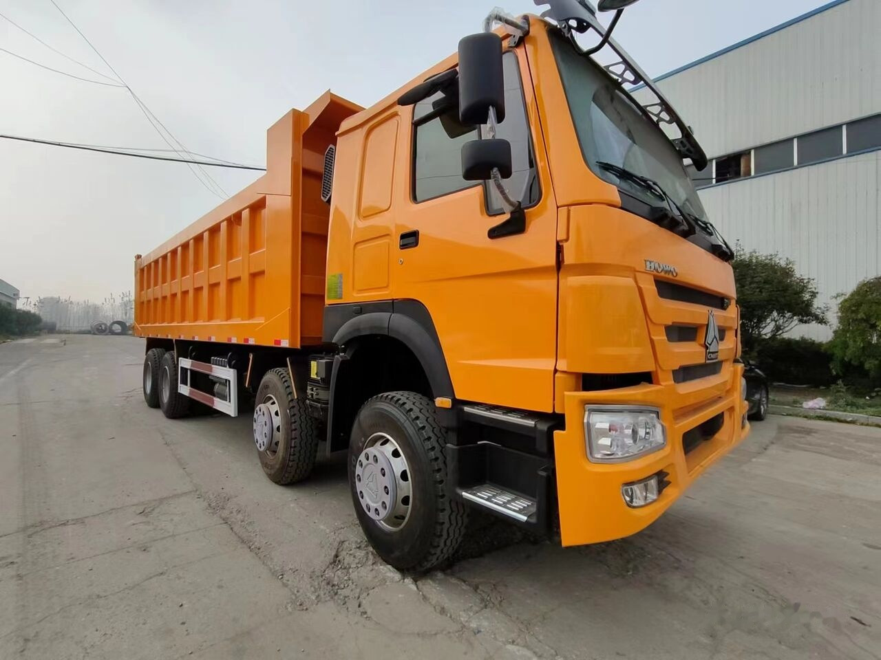 Sinotruk Howo 8*4 - Kippiauto kuorma-auto: kuva Sinotruk Howo 8*4 - Kippiauto kuorma-auto Sinotruk Howo 8*4 - Kippiauto kuorma-auto: kuva Sinotruk Howo 8*4 - Kippiauto kuorma-auto