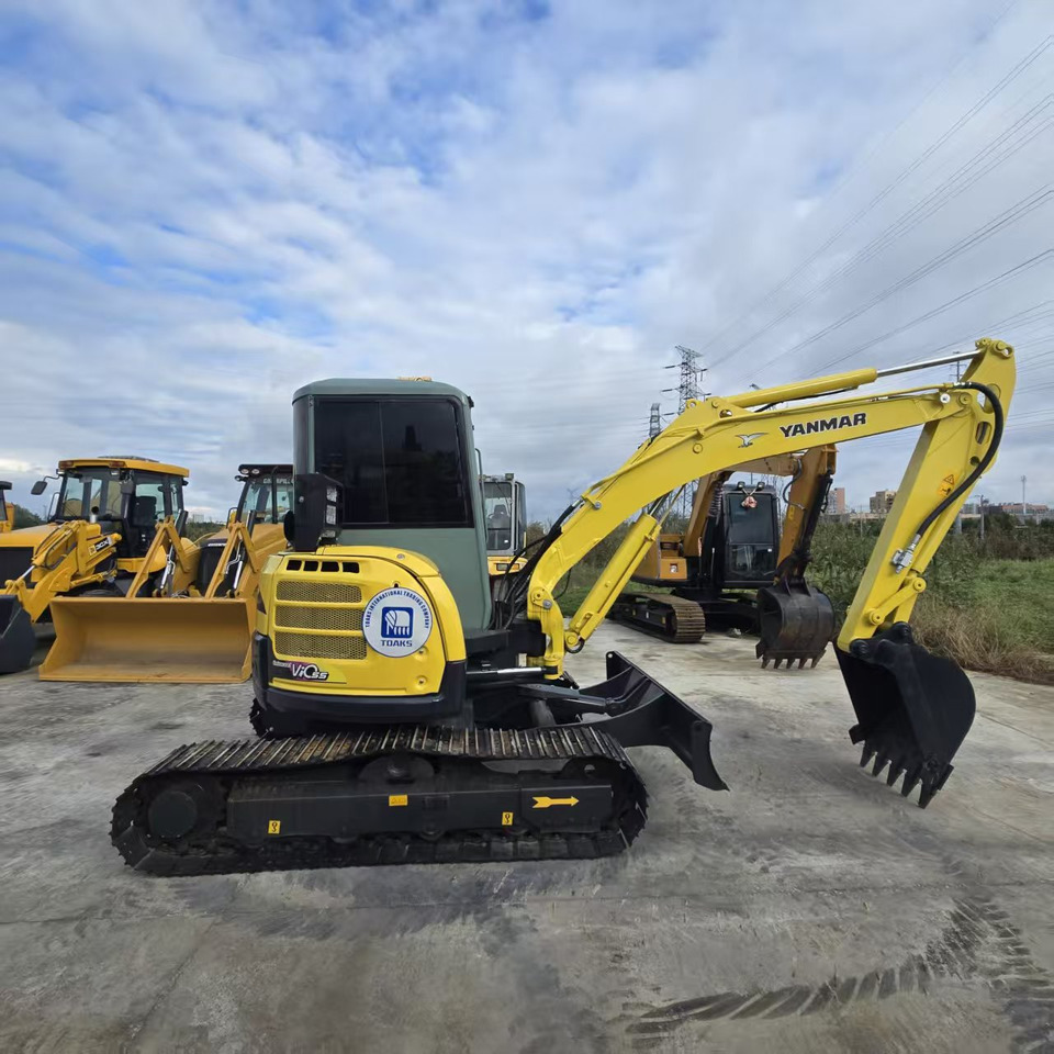 YANMAR Vio55 - Minikuormaaja: kuva YANMAR Vio55 - Minikuormaaja YANMAR Vio55 - Minikuormaaja: kuva YANMAR Vio55 - Minikuormaaja
