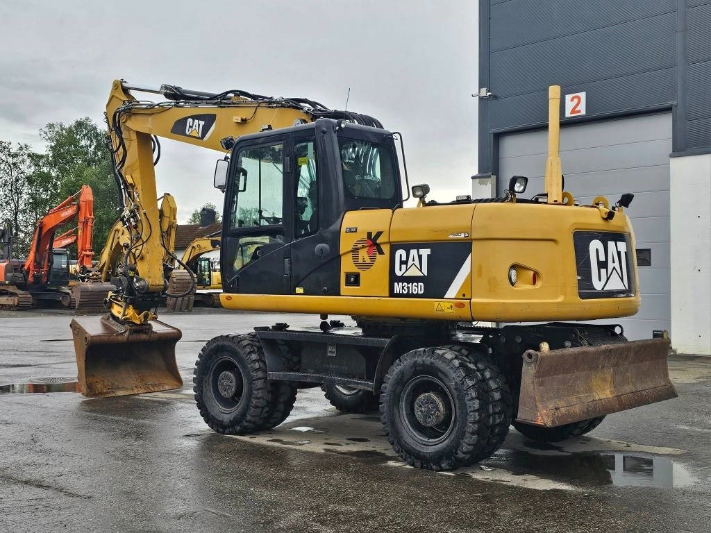 CAT M 316 D - Pyöräalustainen kaivinkone: kuva CAT M 316 D - Pyöräalustainen kaivinkone CAT M 316 D - Pyöräalustainen kaivinkone: kuva CAT M 316 D - Pyöräalustainen kaivinkone