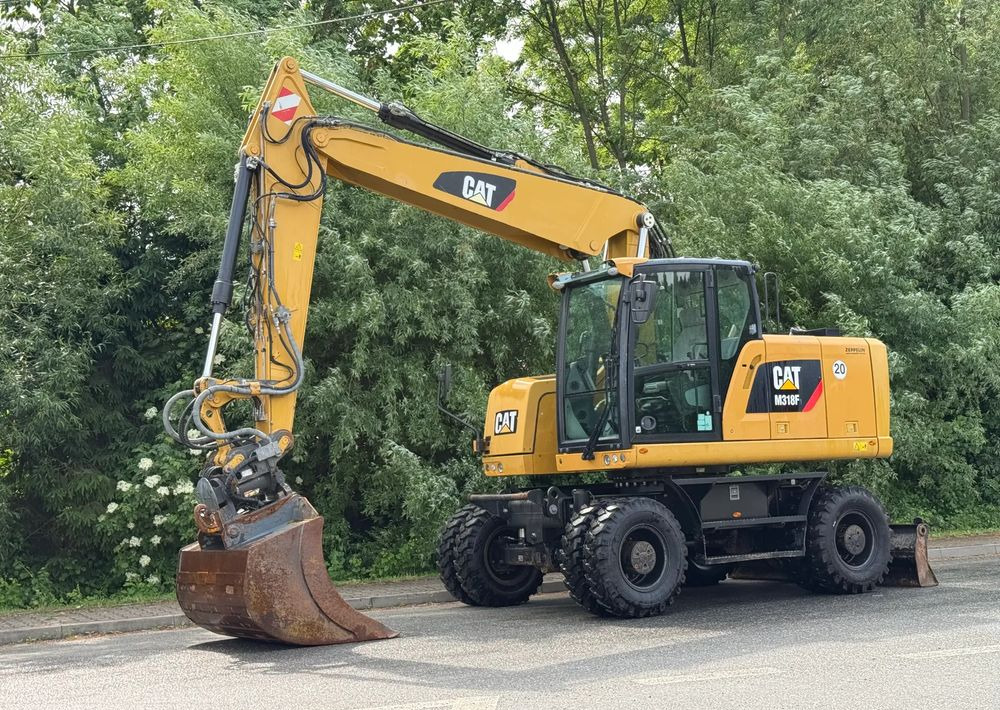 Pyöräalustainen kaivinkone Caterpillar CAT 318 F * Powertilt * Sprowadzony* 9700 MTG * Caterpillar * Stan Perfekcyjny: kuva Pyöräalustainen kaivinkone Caterpillar CAT 318 F * Powertilt * Sprowadzony* 9700 MTG * Caterpillar * Stan Perfekcyjny