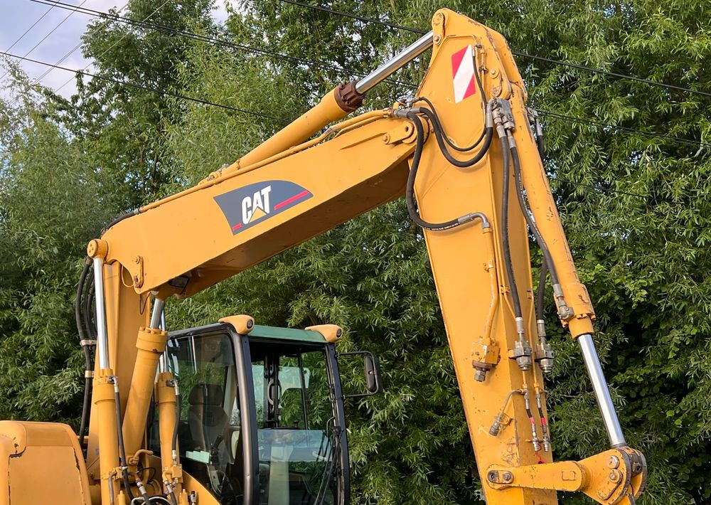 Caterpillar CAT M315C CATERPILLAR SPROWADZONY Bardzo Dobry Stan - Pyöräalustainen kaivinkone: kuva Caterpillar CAT M315C CATERPILLAR SPROWADZONY Bardzo Dobry Stan - Pyöräalustainen kaivinkone Caterpillar CAT M315C CATERPILLAR SPROWADZONY Bardzo Dobry Stan - Pyöräalustainen kaivinkone: kuva Caterpillar CAT M315C CATERPILLAR SPROWADZONY Bardzo Dobry Stan - Pyöräalustainen kaivinkone