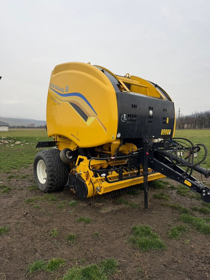 New Holland Roll-Belt 180 Baler - Pyöröpaalain: kuva New Holland Roll-Belt 180 Baler - Pyöröpaalain New Holland Roll-Belt 180 Baler - Pyöröpaalain: kuva New Holland Roll-Belt 180 Baler - Pyöröpaalain