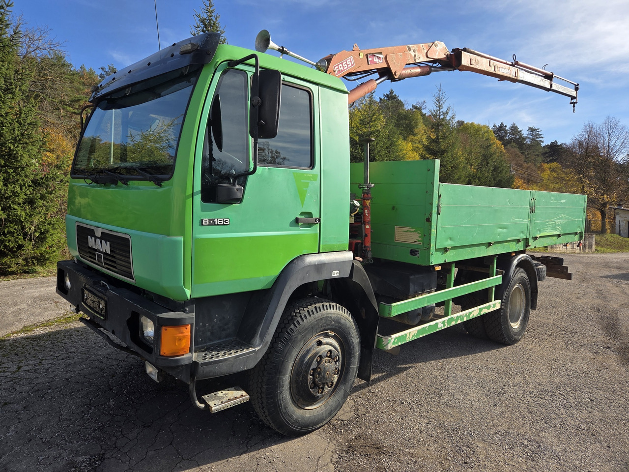 MAN 8.163 4x4 + crane FASSI F45A.22 - Lava-kuorma-auto: kuva MAN 8.163 4x4 + crane FASSI F45A.22 - Lava-kuorma-auto MAN 8.163 4x4 + crane FASSI F45A.22 - Lava-kuorma-auto: kuva MAN 8.163 4x4 + crane FASSI F45A.22 - Lava-kuorma-auto