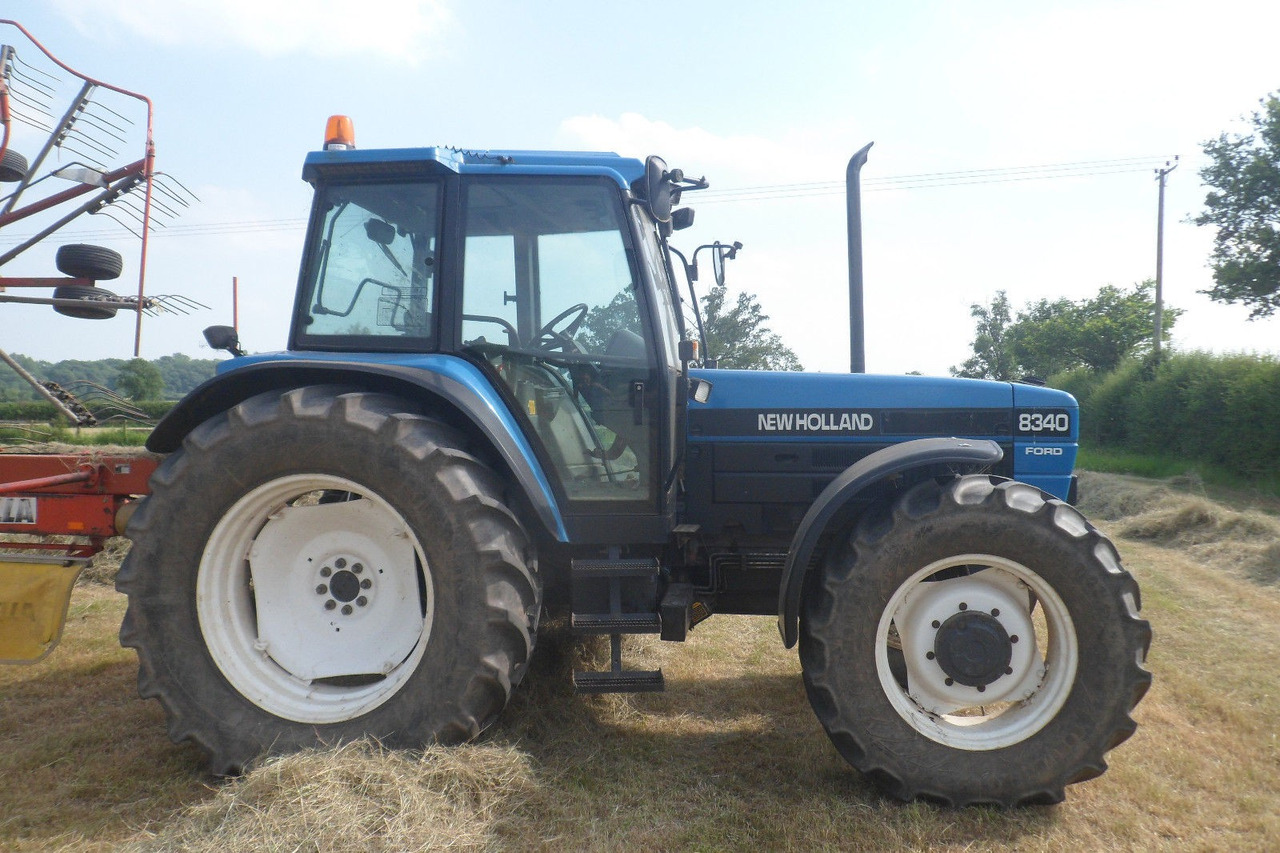 NEW HOLLAND 8340 - Traktori: kuva NEW HOLLAND 8340 - Traktori NEW HOLLAND 8340 - Traktori: kuva NEW HOLLAND 8340 - Traktori