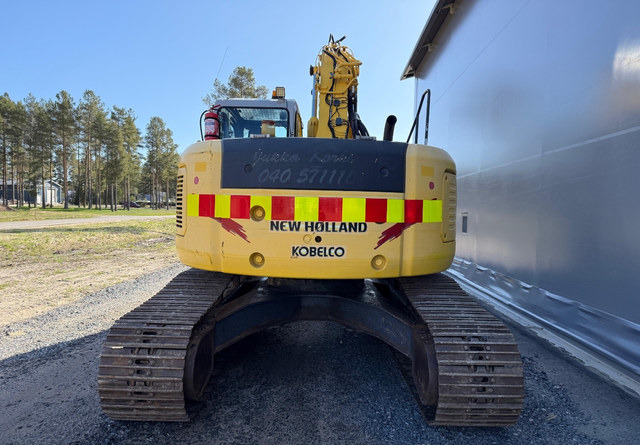 New HollandE235SR - Telakaivukone: kuva New HollandE235SR - Telakaivukone New HollandE235SR - Telakaivukone: kuva New HollandE235SR - Telakaivukone