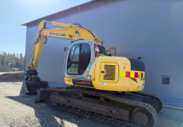 New HollandE235SR - Telakaivukone: kuva  New HollandE235SR - Telakaivukone New HollandE235SR - Telakaivukone: kuva  New HollandE235SR - Telakaivukone