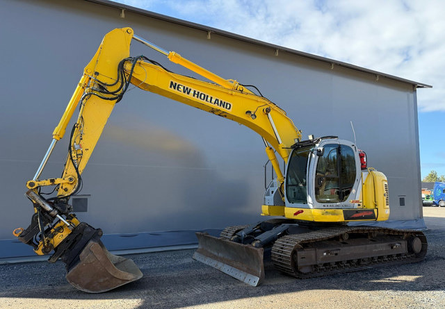 New HollandE235SR - Telakaivukone: kuva  New HollandE235SR - Telakaivukone New HollandE235SR - Telakaivukone: kuva  New HollandE235SR - Telakaivukone