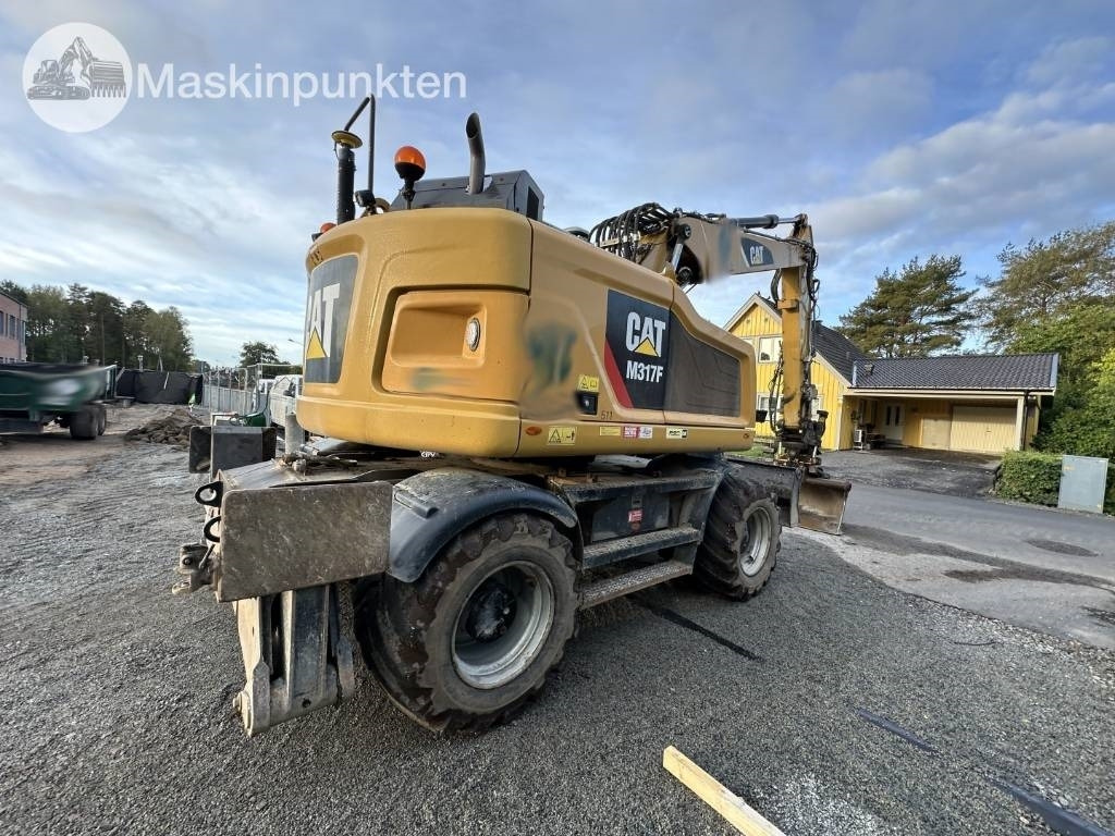 CAT M 317 - Pyöräalustainen kaivinkone: kuva CAT M 317 - Pyöräalustainen kaivinkone CAT M 317 - Pyöräalustainen kaivinkone: kuva CAT M 317 - Pyöräalustainen kaivinkone
