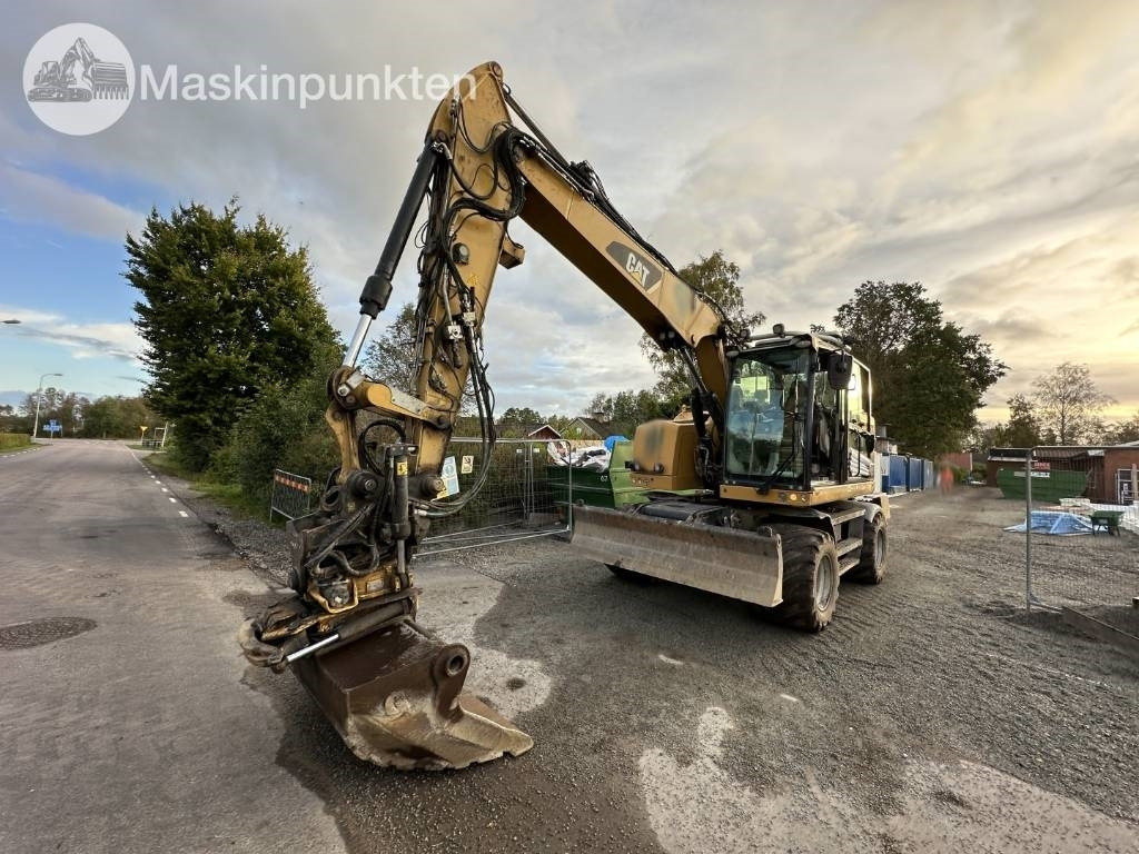 CAT M 317 - Pyöräalustainen kaivinkone: kuva CAT M 317 - Pyöräalustainen kaivinkone CAT M 317 - Pyöräalustainen kaivinkone: kuva CAT M 317 - Pyöräalustainen kaivinkone