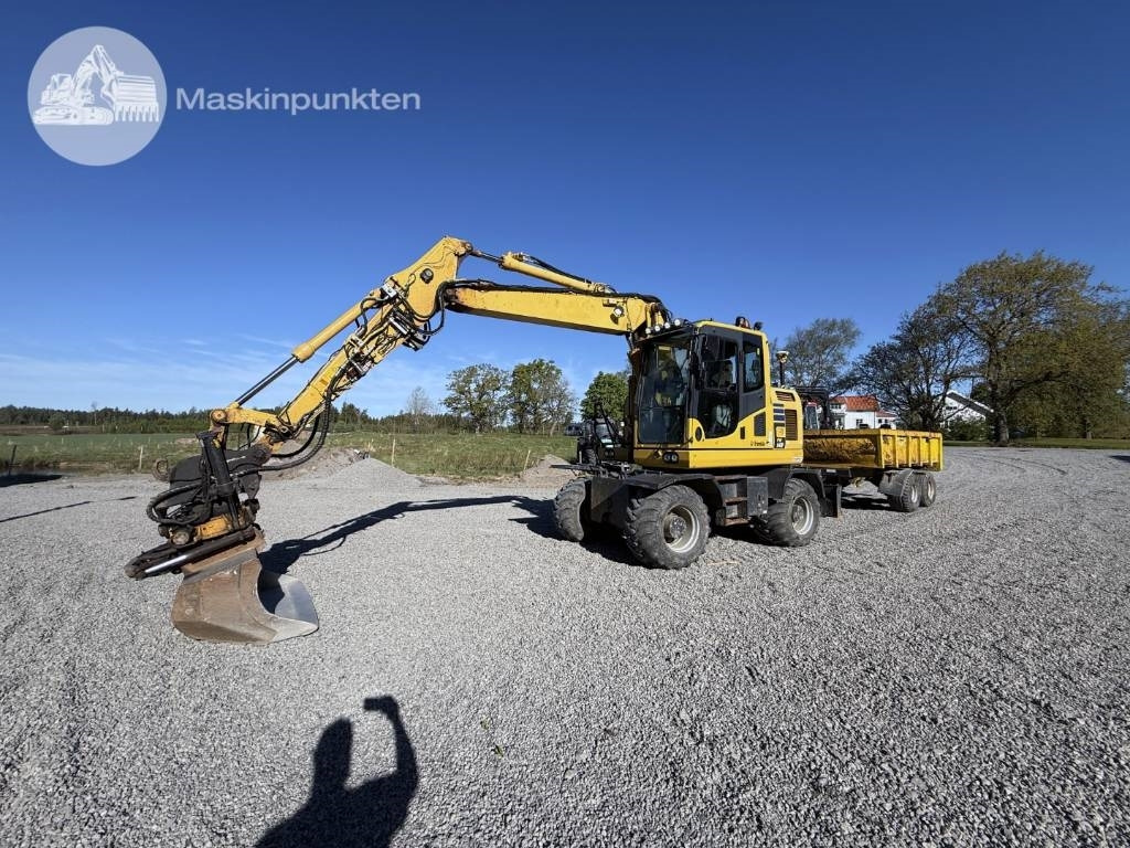 Komatsu PW 148-10 - Pyöräalustainen kaivinkone: kuva Komatsu PW 148-10 - Pyöräalustainen kaivinkone Komatsu PW 148-10 - Pyöräalustainen kaivinkone: kuva Komatsu PW 148-10 - Pyöräalustainen kaivinkone