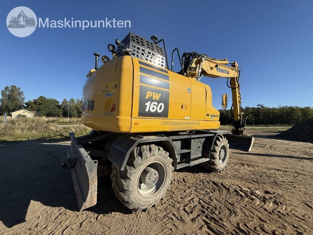Komatsu PW 160 - Pyöräalustainen kaivinkone: kuva Komatsu PW 160 - Pyöräalustainen kaivinkone Komatsu PW 160 - Pyöräalustainen kaivinkone: kuva Komatsu PW 160 - Pyöräalustainen kaivinkone
