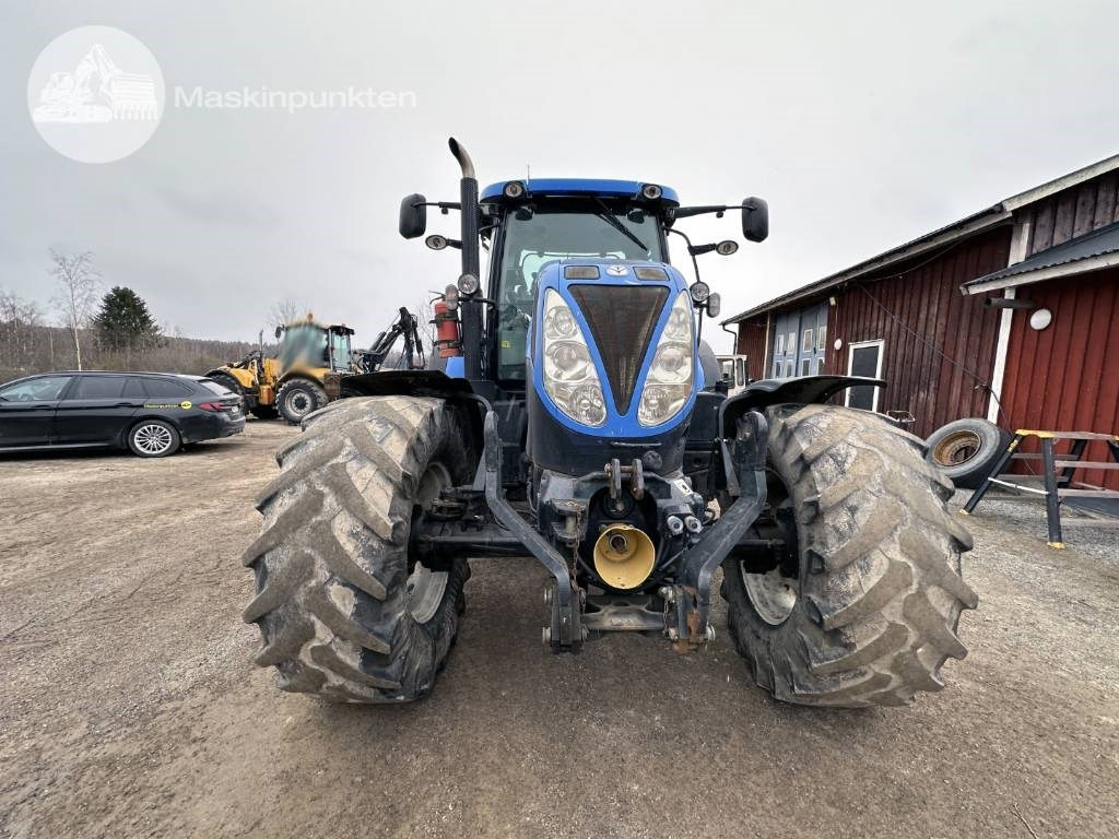 New Holland T 7.185 - Traktori: kuva New Holland T 7.185 - Traktori New Holland T 7.185 - Traktori: kuva New Holland T 7.185 - Traktori