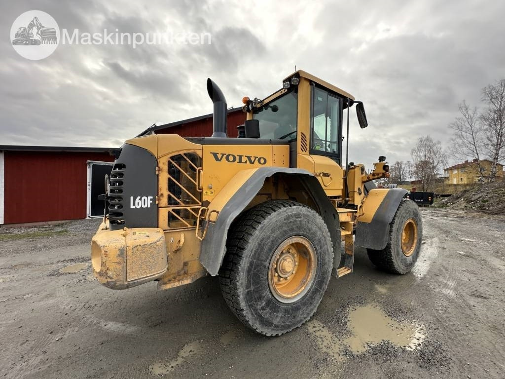 Volvo L 60 F - Pyöräkuormaaja: kuva Volvo L 60 F - Pyöräkuormaaja Volvo L 60 F - Pyöräkuormaaja: kuva Volvo L 60 F - Pyöräkuormaaja