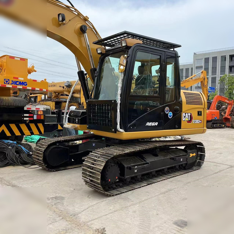 CATERPILLAR 313D2 GC - Telakaivukone: kuva CATERPILLAR 313D2 GC - Telakaivukone CATERPILLAR 313D2 GC - Telakaivukone: kuva CATERPILLAR 313D2 GC - Telakaivukone
