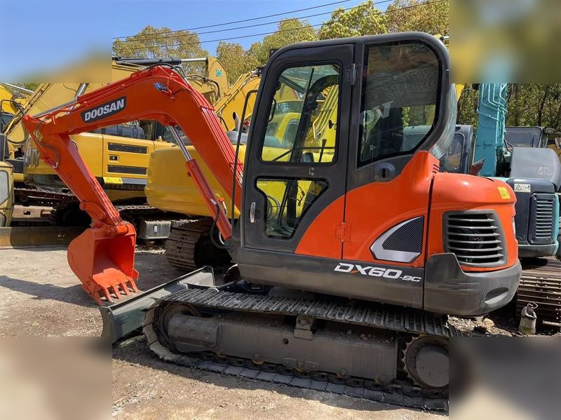 DOOSAN DX60E-9C - Minikuormaaja: kuva DOOSAN DX60E-9C - Minikuormaaja DOOSAN DX60E-9C - Minikuormaaja: kuva DOOSAN DX60E-9C - Minikuormaaja