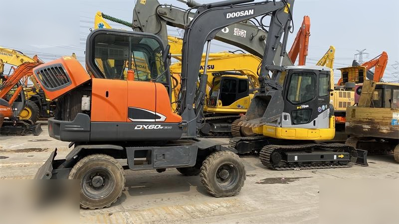 DOOSAN DX60W ECO - Pyöräalustainen kaivinkone: kuva DOOSAN DX60W ECO - Pyöräalustainen kaivinkone DOOSAN DX60W ECO - Pyöräalustainen kaivinkone: kuva DOOSAN DX60W ECO - Pyöräalustainen kaivinkone