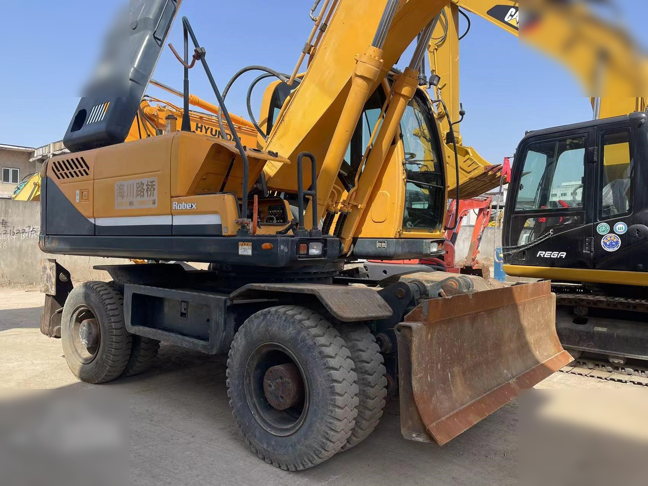 HYUNDAI ROBEX 210W-9 - Pyöräalustainen kaivinkone: kuva HYUNDAI ROBEX 210W-9 - Pyöräalustainen kaivinkone HYUNDAI ROBEX 210W-9 - Pyöräalustainen kaivinkone: kuva HYUNDAI ROBEX 210W-9 - Pyöräalustainen kaivinkone