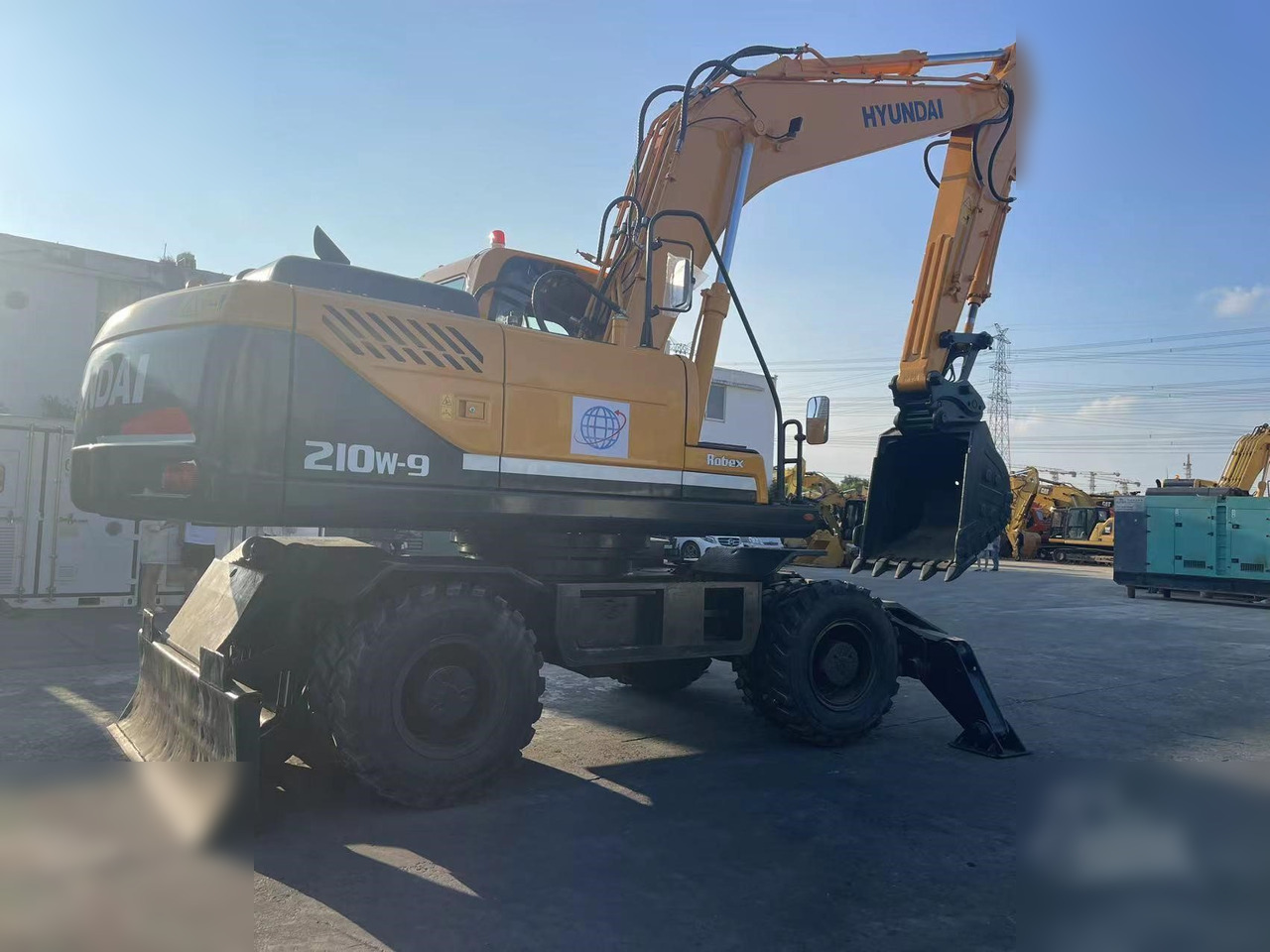 HYUNDAI ROBEX 210W-9 - Pyöräalustainen kaivinkone: kuva HYUNDAI ROBEX 210W-9 - Pyöräalustainen kaivinkone HYUNDAI ROBEX 210W-9 - Pyöräalustainen kaivinkone: kuva HYUNDAI ROBEX 210W-9 - Pyöräalustainen kaivinkone