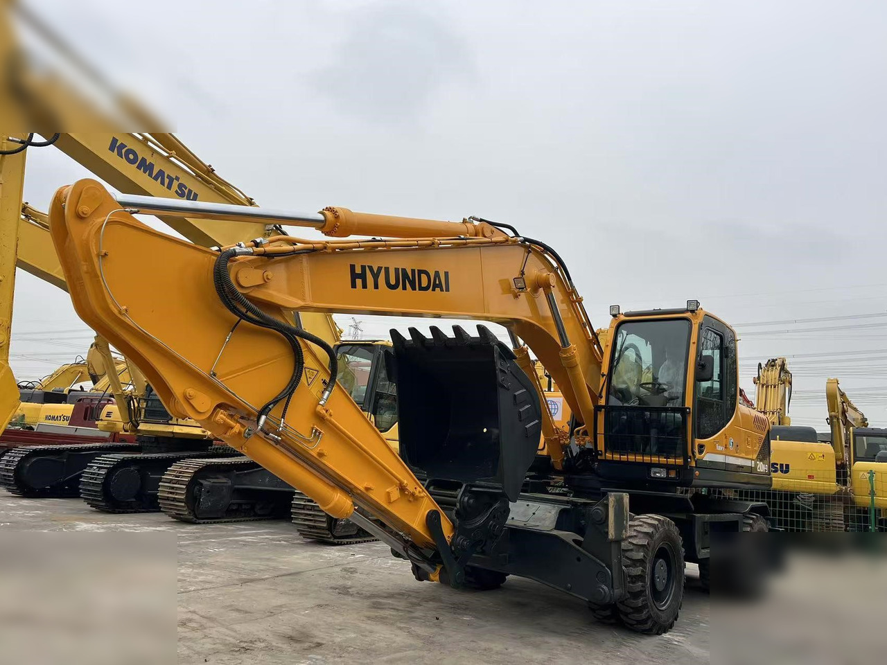 HYUNDAI ROBEX 210W-9S - Pyöräalustainen kaivinkone: kuva HYUNDAI ROBEX 210W-9S - Pyöräalustainen kaivinkone HYUNDAI ROBEX 210W-9S - Pyöräalustainen kaivinkone: kuva HYUNDAI ROBEX 210W-9S - Pyöräalustainen kaivinkone