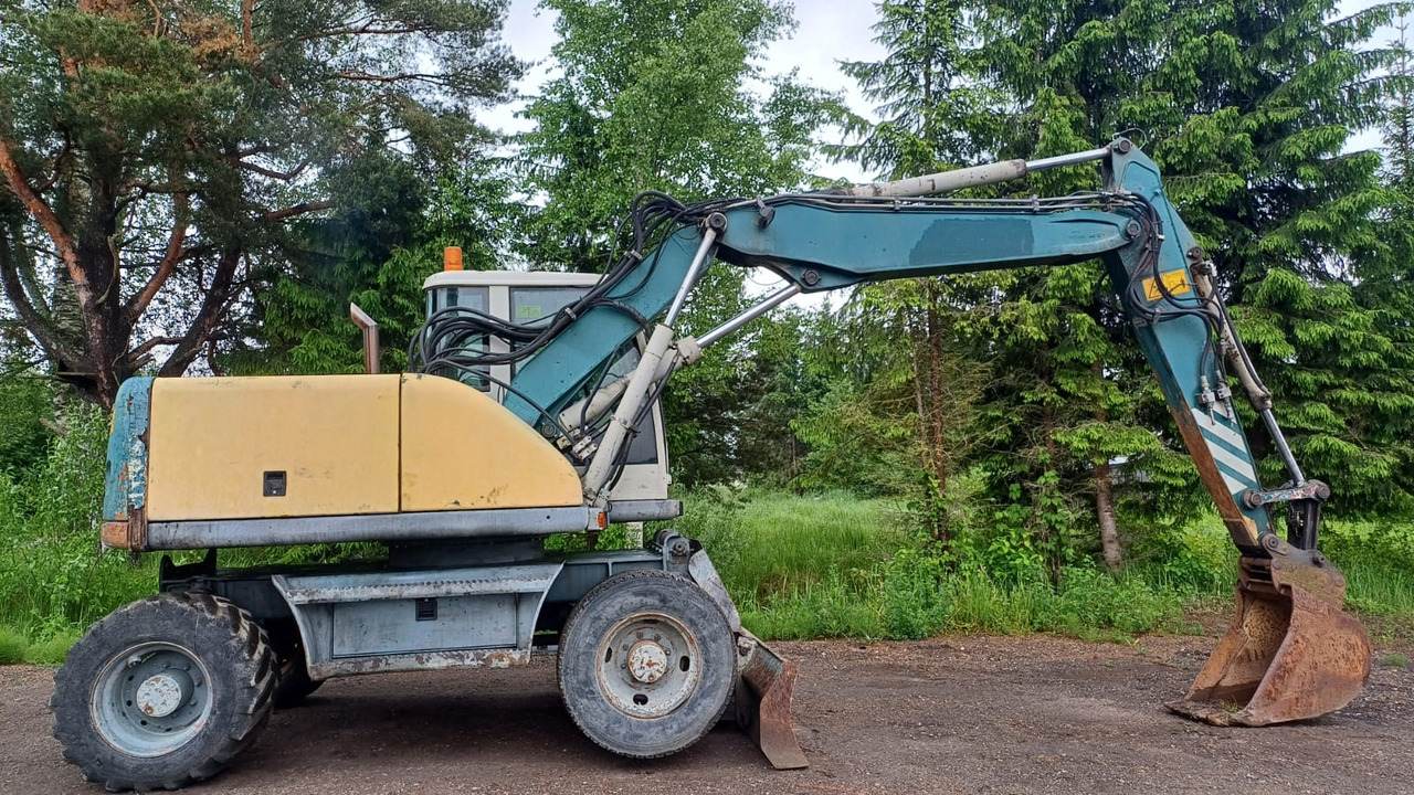 Volvo EW140 - Pyöräalustainen kaivinkone: kuva Volvo EW140 - Pyöräalustainen kaivinkone Volvo EW140 - Pyöräalustainen kaivinkone: kuva Volvo EW140 - Pyöräalustainen kaivinkone