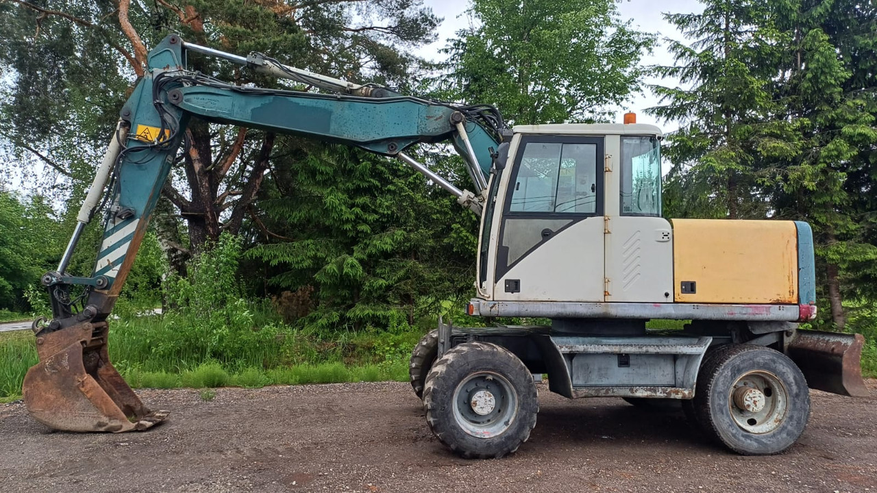 Volvo EW140 - Pyöräalustainen kaivinkone: kuva Volvo EW140 - Pyöräalustainen kaivinkone Volvo EW140 - Pyöräalustainen kaivinkone: kuva Volvo EW140 - Pyöräalustainen kaivinkone