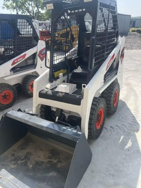 BOBCAT S70 - Liukuohjattu kuormaaja: kuva BOBCAT S70 - Liukuohjattu kuormaaja BOBCAT S70 - Liukuohjattu kuormaaja: kuva BOBCAT S70 - Liukuohjattu kuormaaja