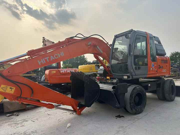 Hot Sale! Used Hitachi ZX130 Wheel Excavator |Excellent Condition| Best Price | Perfect for Construction & Road Projects - Pyöräalustainen kaivinkone: kuva Hot Sale! Used Hitachi ZX130 Wheel Excavator |Excellent Condition| Best Price | Perfect for Construction & Road Projects - Pyöräalustainen kaivinkone Hot Sale! Used Hitachi ZX130 Wheel Excavator |Excellent Condition| Best Price | Perfect for Construction & Road Projects - Pyöräalustainen kaivinkone: kuva Hot Sale! Used Hitachi ZX130 Wheel Excavator |Excellent Condition| Best Price | Perfect for Construction & Road Projects - Pyöräalustainen kaivinkone