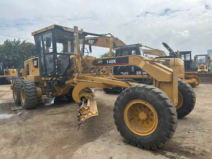 Uusi Tiehöylä Used Caterpillar CAT 140k Land Road Motor Grader CAT140k Used Grader Cheap Price for Sale: kuva Uusi Tiehöylä Used Caterpillar CAT 140k Land Road Motor Grader CAT140k Used Grader Cheap Price for Sale