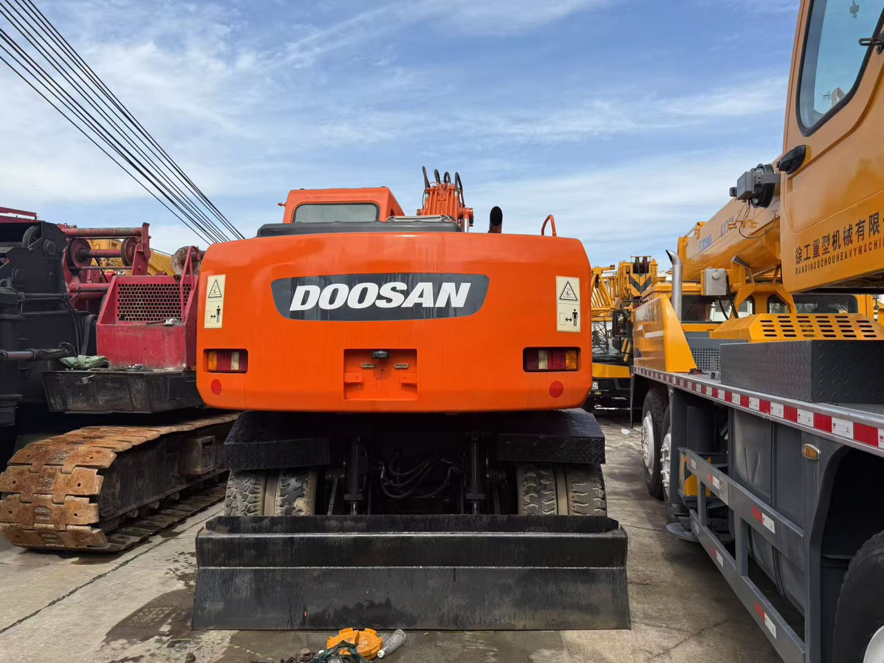 DOOSAN DH150W-7 - Pyöräalustainen kaivinkone: kuva DOOSAN DH150W-7 - Pyöräalustainen kaivinkone DOOSAN DH150W-7 - Pyöräalustainen kaivinkone: kuva DOOSAN DH150W-7 - Pyöräalustainen kaivinkone