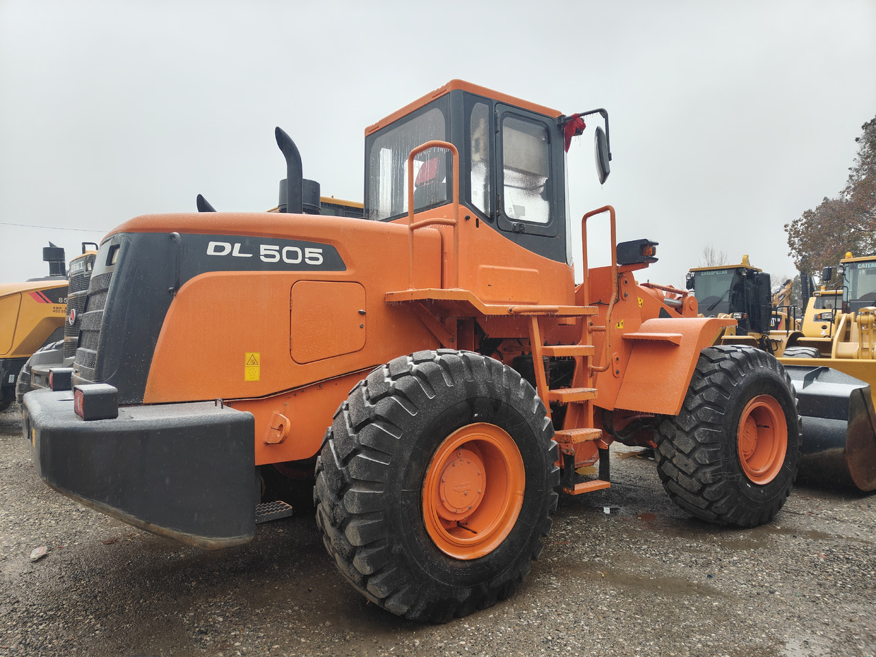 DOOSAN DL505 - Pyöräkuormaaja: kuva DOOSAN DL505 - Pyöräkuormaaja DOOSAN DL505 - Pyöräkuormaaja: kuva DOOSAN DL505 - Pyöräkuormaaja