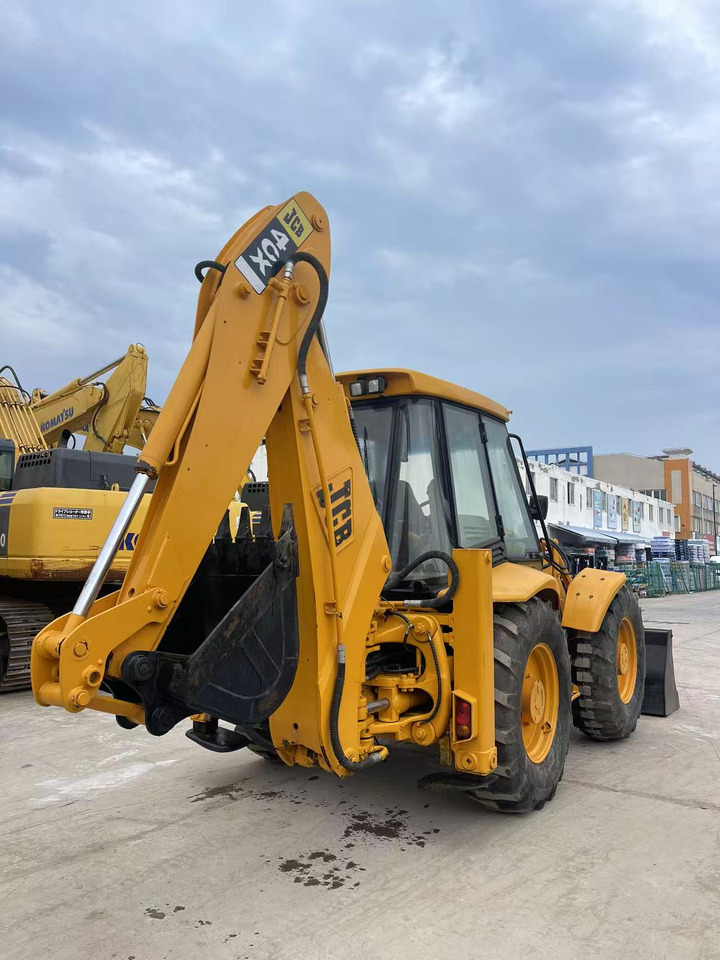 JCB 4CX - Kaivuri-trukki: kuva JCB 4CX - Kaivuri-trukki JCB 4CX - Kaivuri-trukki: kuva JCB 4CX - Kaivuri-trukki