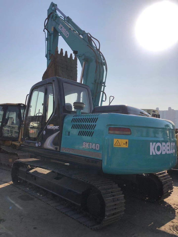 KOBELCO SK140 - Minikuormaaja: kuva KOBELCO SK140 - Minikuormaaja KOBELCO SK140 - Minikuormaaja: kuva KOBELCO SK140 - Minikuormaaja