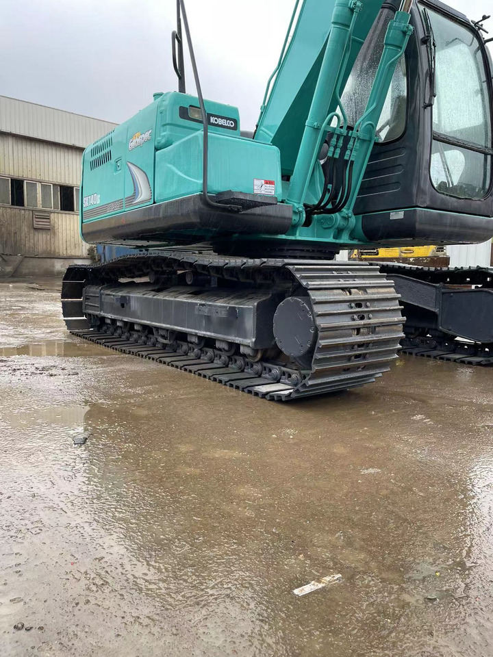 KOBELCO SK140 - Minikuormaaja: kuva KOBELCO SK140 - Minikuormaaja KOBELCO SK140 - Minikuormaaja: kuva KOBELCO SK140 - Minikuormaaja