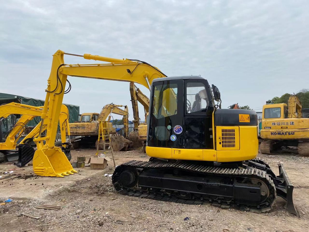 KOMATSU PC128US - Telakaivukone: kuva KOMATSU PC128US - Telakaivukone KOMATSU PC128US - Telakaivukone: kuva KOMATSU PC128US - Telakaivukone