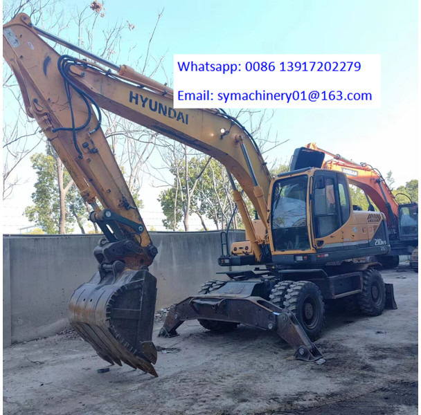 Hyundai R210W - Pyöräalustainen kaivinkone: kuva Hyundai R210W - Pyöräalustainen kaivinkone Hyundai R210W - Pyöräalustainen kaivinkone: kuva Hyundai R210W - Pyöräalustainen kaivinkone